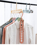9-in-1 Space Saver! –🤩Rotating Windproof Clothes Organizer (2pcs)